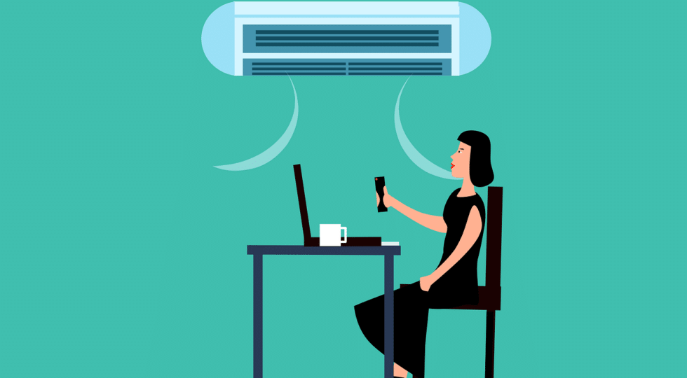 woman sitting at table with air conditioning