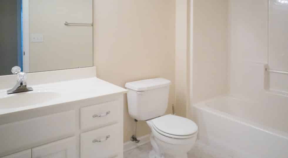 small white apartment bathroom