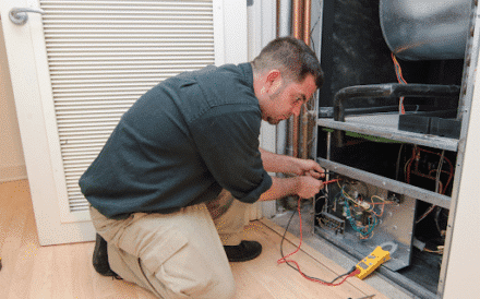 Man installing a new heating system