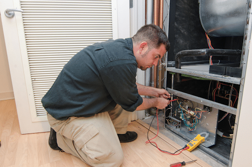 Man installing a new heating system